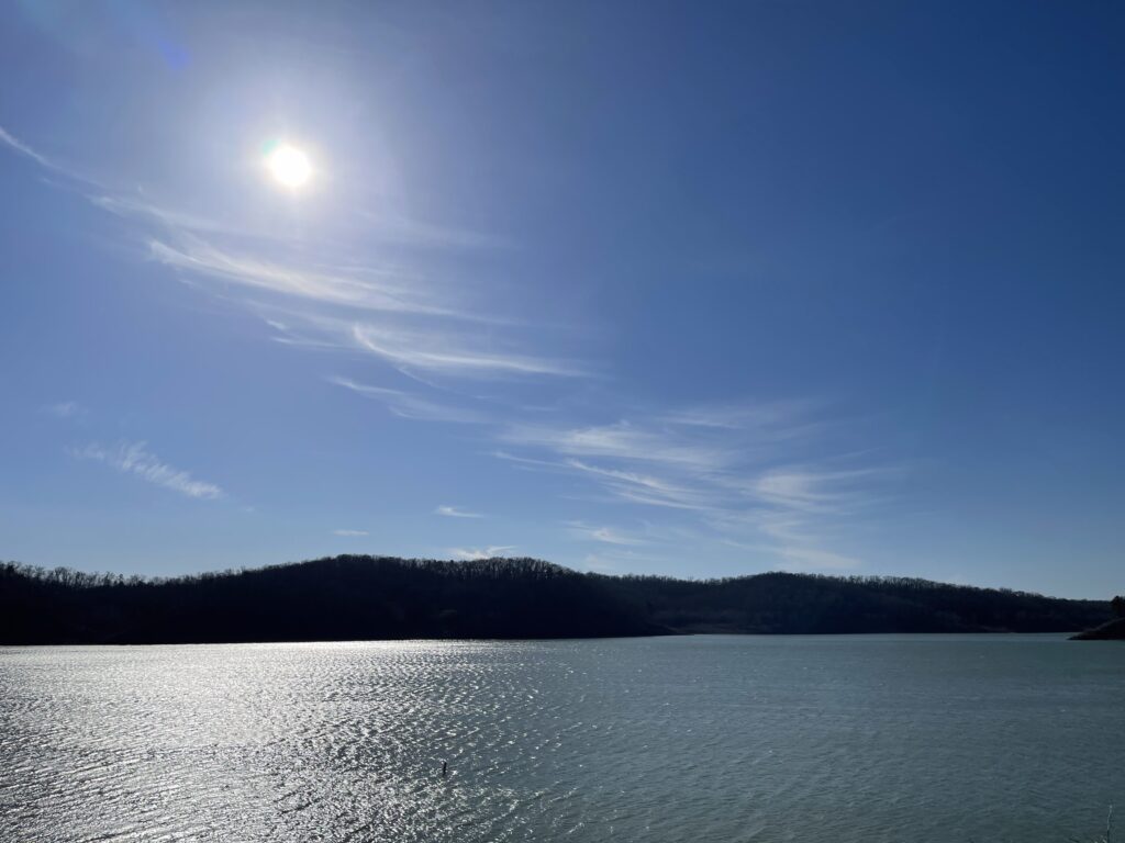 Clearwater Lake of the Ozarks the sun shining down on Clearwater Lake in the Mark Twain National Forest
